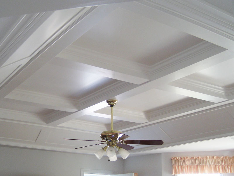 Traditional coffered ceiling  . Angled  to fit incorporating beams and panels  acrylic enamel finish 