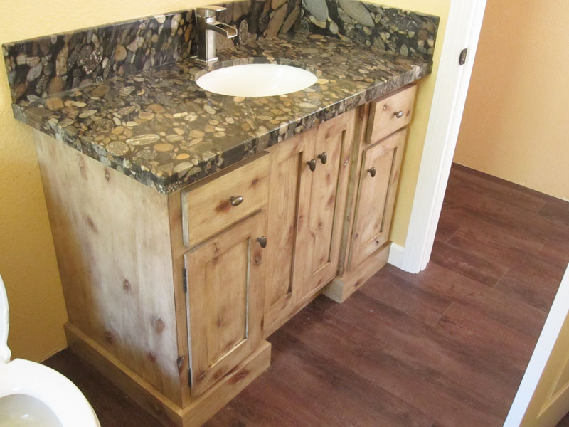 Knotty alder recessed front vanity with rub out glazed  finish