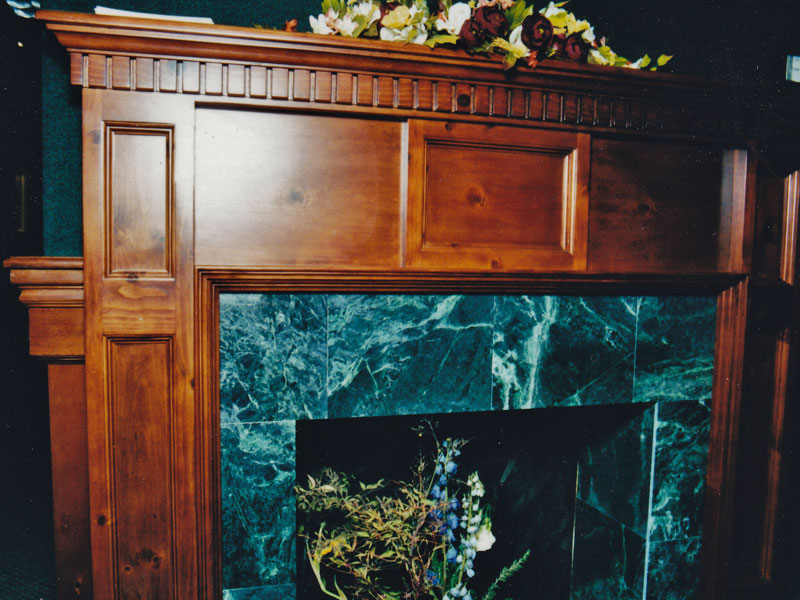 Traditional pine  mantel with dentil mold , paneled columns