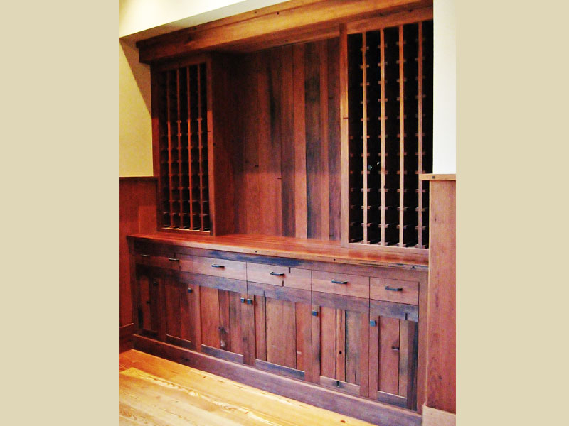 Floor to ceiling wine unit dovetailed under mount drawers ,upper racks, custom doors