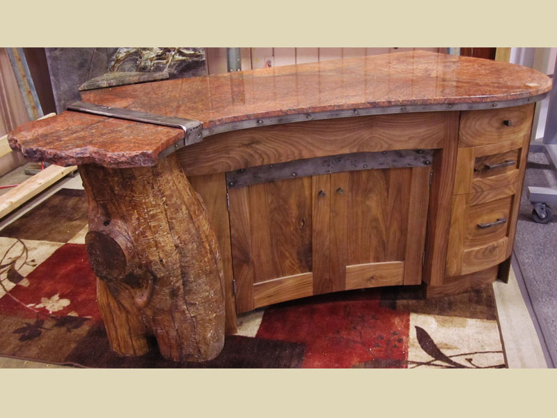 Curved knotty walnut furniture
Natural tree sump end , steal braces and trim,  bank of drawers  